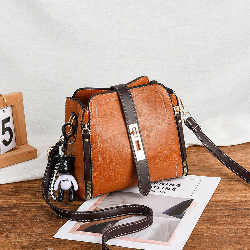 🎁Hot Sale 70% OFF⏳High-Quality PU Crossbody Bag with Doll Decor