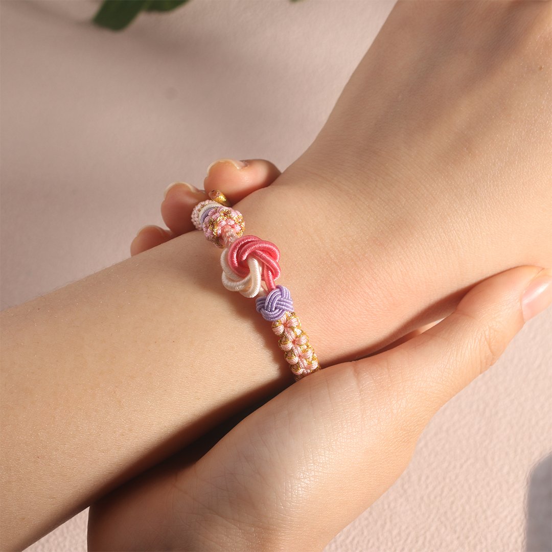 BUY 1 GET 1 FREE--FOR DAUGHTER/GRANDDAUGHTER 🩷 - A LINK THAT CAN NEVER BE UNDONE PEACH BLOSSOM KNOT BRACELET🎀